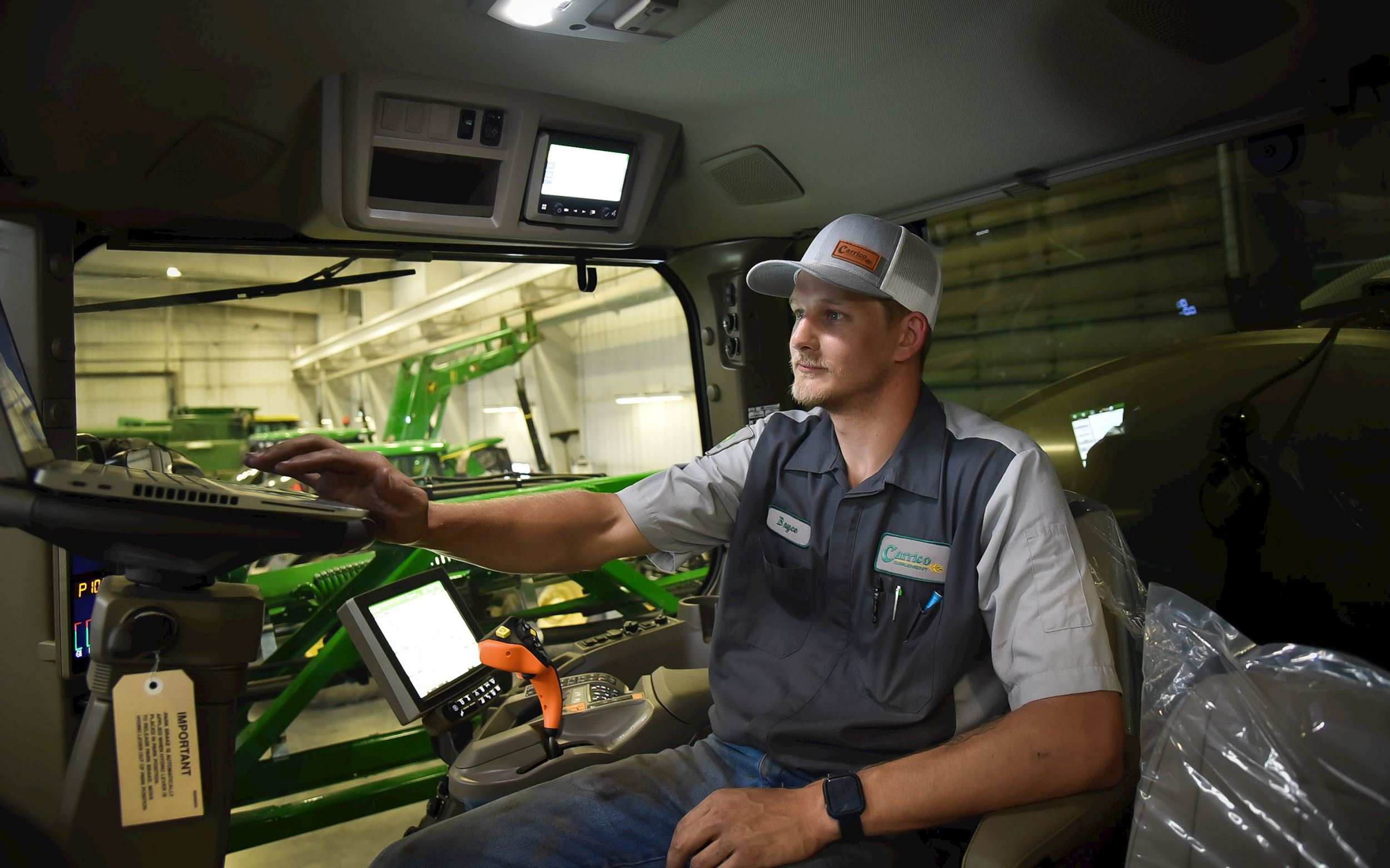 Carrico John Deere Ag Technician working on equipment